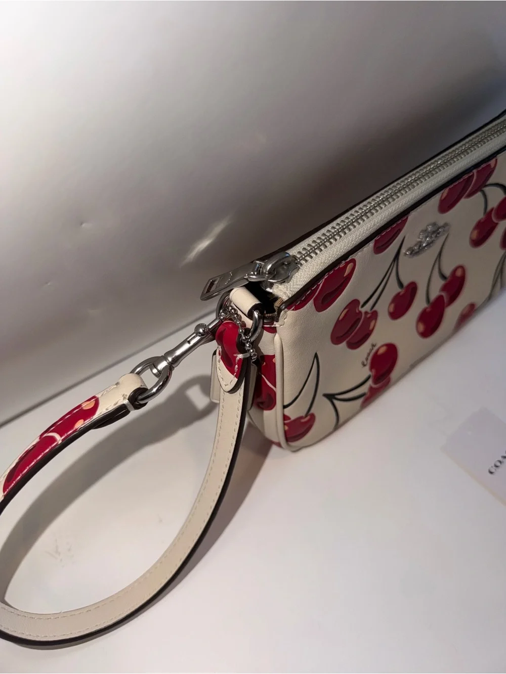 COACH New Cream Leather Small Wristlet with Red Cherry Print